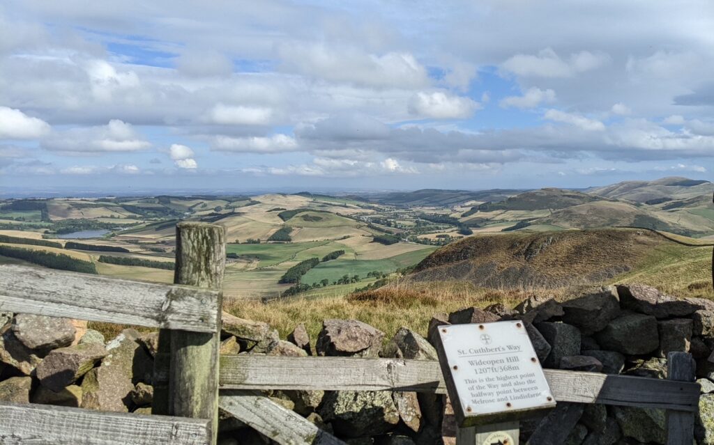 A view towards distant hills and fields at Wide-open Hill