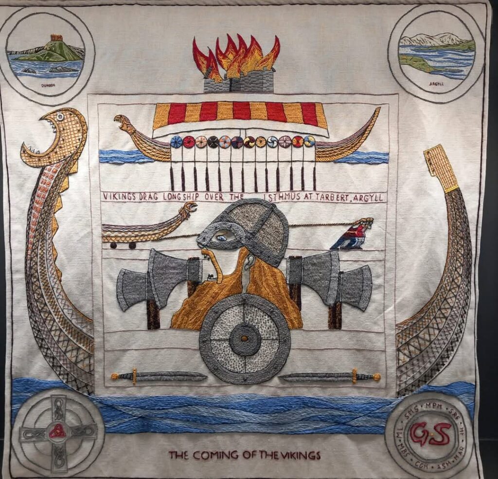 An elaborate embroidered panel showing a Viking ship with other details.